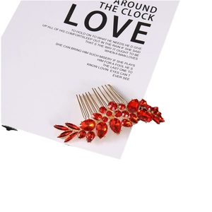 Elegant gold leaf hair comb with red rhinestones and crystals for weddings and parties