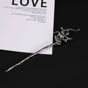 Irregular liquid metal hair stick in dark silver finish with a modern Hanfu aesthetic