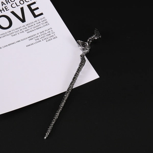 Minimalist irregular dark grey metal hair pin with unique lava texture and vintage design