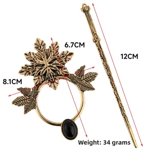 Detail view of Gothic maple leaf hair slide with black gemstone and dimensions 34g