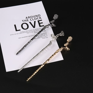 Irregular hammered metal hairpins set in gold, silver, and black for a unique vintage style