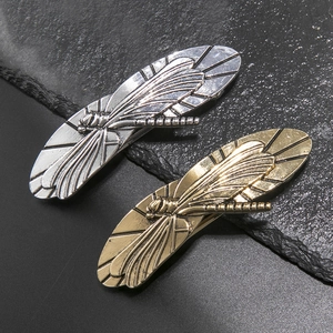 Classic dragonfly hair clips in vintage bronze and silver metal finish with relief detail