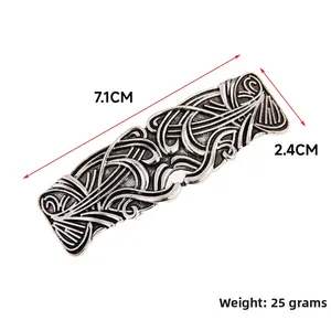 Detailed view of silver vintage hair clip showing Baroque carvings and 7.1cm size measurement