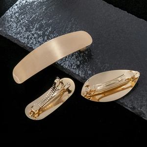 Lot de 3 barrettes à cheveux géométriques en métal doré aux formes ovales et rectangulaires