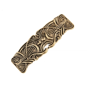 Vintage bronze metal hair clip with intricate Celtic spiral floral engravings on white background