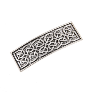 Detailed view of vintage silver alloy hair clip featuring intricate Celtic knot patterns