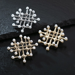 Vintage palace style pearl brooch in gold and silver plating with hollow grid design