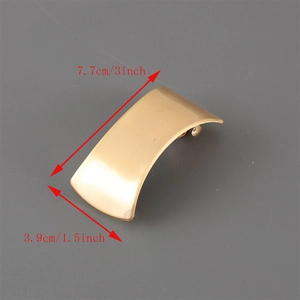 Golden alloy geometric spring hair clip with brushed metal finish measuring 7.7 cm