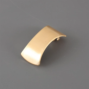 Minimalist gold alloy hair clip with a brushed matte finish and spring clasp design