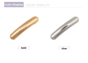 Close-up of minimalist gold and silver cylindrical metal hair clips with polished finish