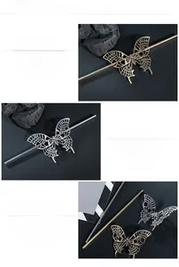 Detailed macro view of hollowed metal butterfly hairpins with premium mirror polishing
