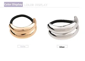 Detailed view of elastic hair ties with gold and silver geometric metal accents