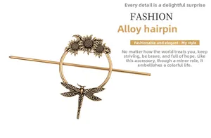 Detailed close-up of retro alloy hairpin with sunflower frame and dragonfly design