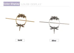 Detail of round sunflower and dragonfly hair pins in gold and silver finishes