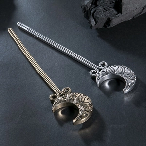 Vintage crescent moon hair sticks with intricate engraved patterns in silver and gold finish