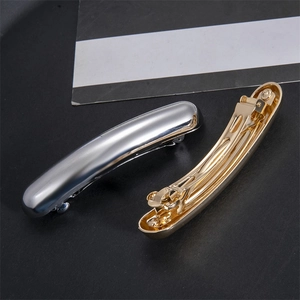 Polished gold and silver minimalist metal bar hair clips for women in sleek cylinder design