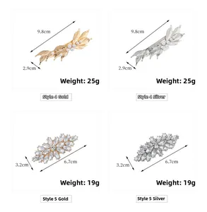 Detailed views of leaf hair clips with pearls and rhinestone clusters in gold and silver