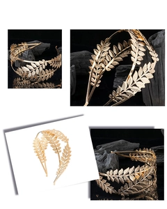 Macro detail of gold double-layered leaf headband with intricate Greek laurel design