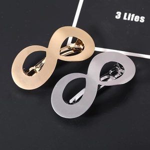 Minimalist infinity symbol metal hair clips in matte gold and silver finishes