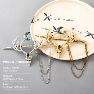 Minimalist antler and moon alloy hair stick with vintage metal finish and tassel chain