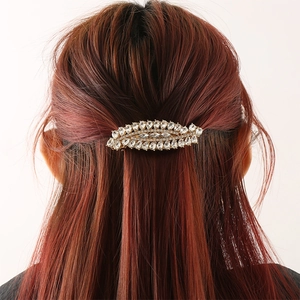 Leaf shaped gold spring hair clip with sparkling rhinestones for elegant hairstyles