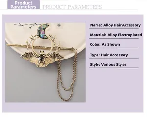 Detailed view of gothic hair stick with bat, crescent moon, and chain accessories