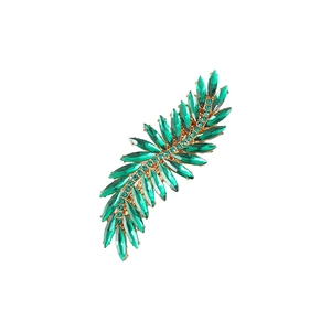 Sparkling leaf hair clip with green crystals and gold finish for women's updos