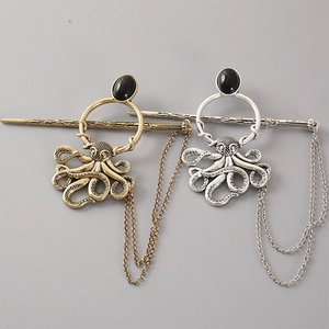 Gothic octopus hair pins in antique gold and silver finish with black gemstone detail