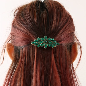 Elegant gold alloy hair clip featuring marquise-cut green rhinestones in a floral cluster design