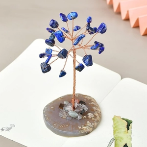 Handgemaakte levensboom met lapis lazuli op een basis van natuurlijke agaatplak