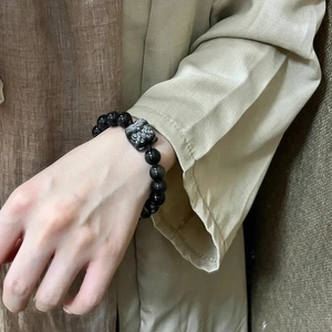Obsidian stone beaded bracelet with carved guardian lion charm for men and women