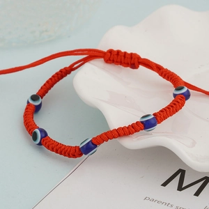 Handmade red woven turtle evil eye bracelet with adjustable beads for women