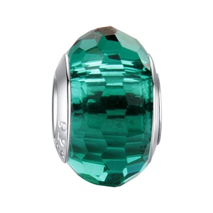 Detailed macro view of S925 sterling silver charm with faceted green crystal bead