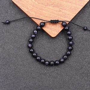 Verstelbare blauwe goudsteen armband met sterrenpatroon en zwart gevlochten koord