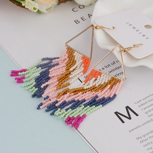 Bohemian style gold triangle earrings with colorful handmade seed bead fringe tassels