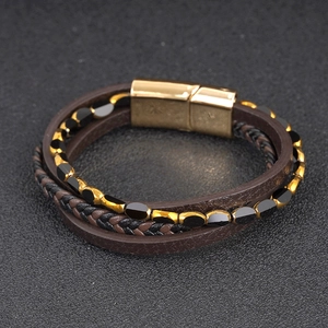 Multilayer leather bracelet with brown braids, glass beads and golden magnetic clasp