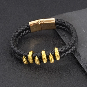 Men's double braided black leather bracelet with six golden claw pendants and magnetic clasp