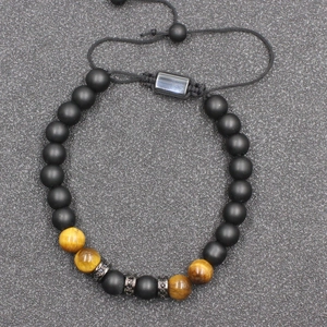 Adjustable tiger eye and black onyx beaded bracelet for men with woven cord and metal spacers