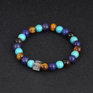 Bracciale in lapislazzuli e occhio di tigre con perla in metallo simbolo Om argento