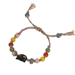 Handmade woven colorful rope bracelet with ceramic beads and black cat charm pendant
