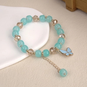 Handcrafted blue crystal butterfly beaded bracelet with gold chain extension for women