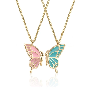 Golden butterfly necklace set with pink and blue puzzle pendants for couples