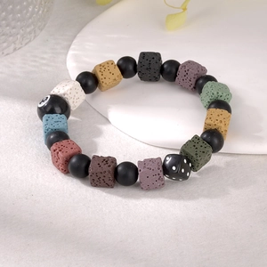 Colorful lava stone bracelet with billiards number 8 and dice charms on stone plate
