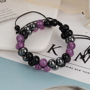 Triple protection bracelet with tiger eye, obsidian, and hematite beads on black cord