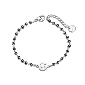 Adjustable black beaded bracelet with stainless steel smiley face pendant and S-STEEL tag