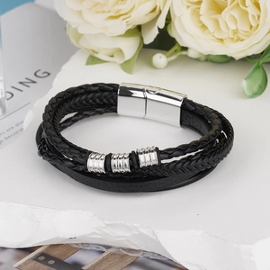 Multilayer black woven leather bracelet for men featuring silver beads and magnetic clasp