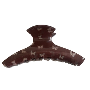 Brown hair claw clip with pink butterfly print and polished finish for women hair styling