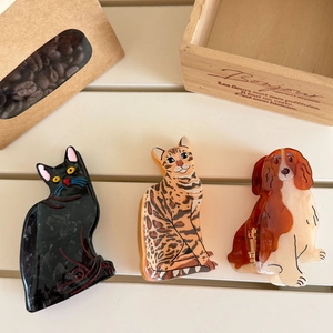 Three-piece acetate hair claw clips set featuring cute cat and dog animal designs
