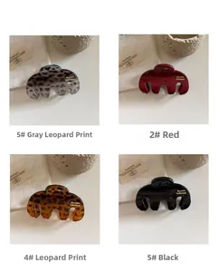 Detailed grid showing leopard and solid color handbag-shaped hair claws in four colors