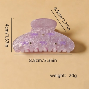 Pince à cheveux élégante en acrylique violet avec texture marbrée et détails en strass